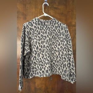 Grey and black leopard print sweater
